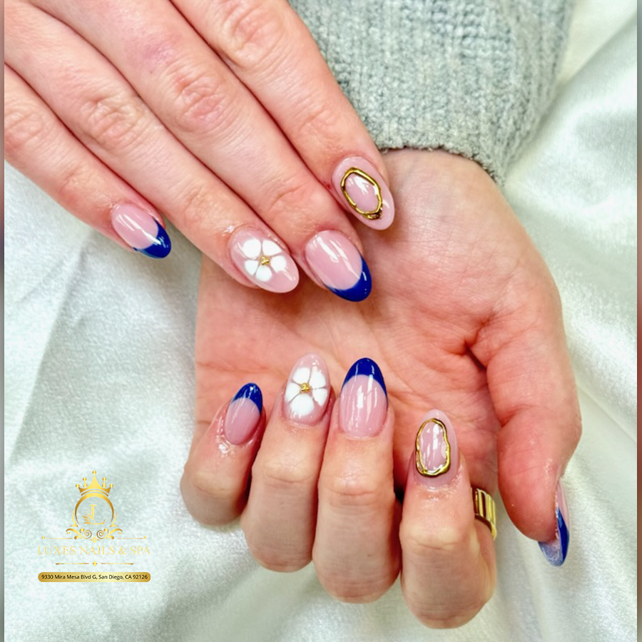 Navy French tips and white flowers